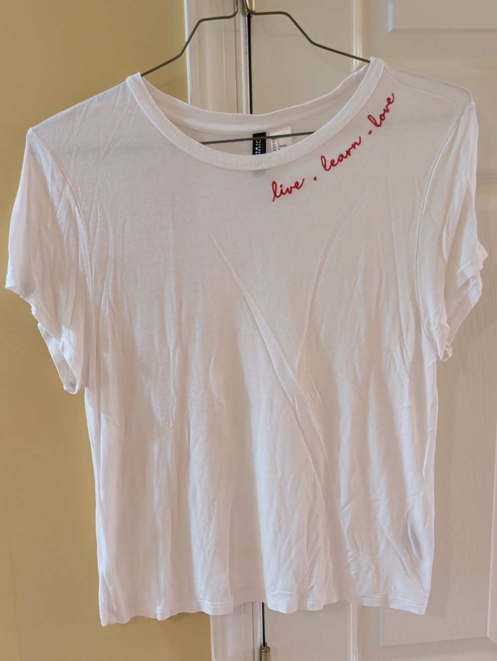 H&M White Short-Sleeve Tee with Red Script "live · learn · love"